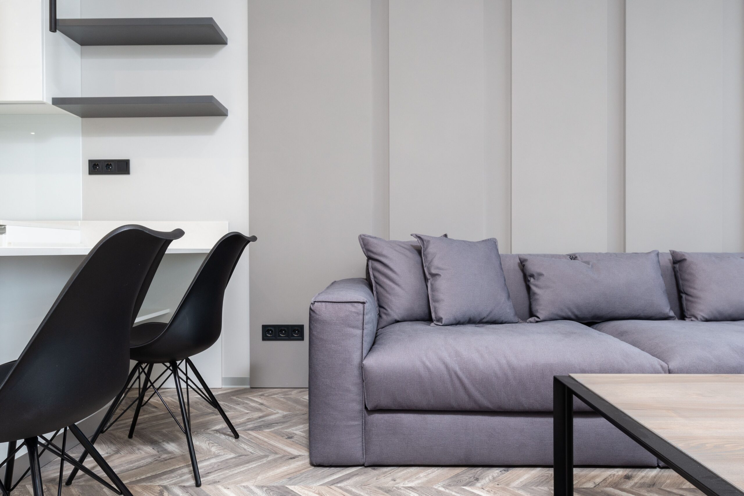 Modern living room with luxury vinyl tile herringbone flooring