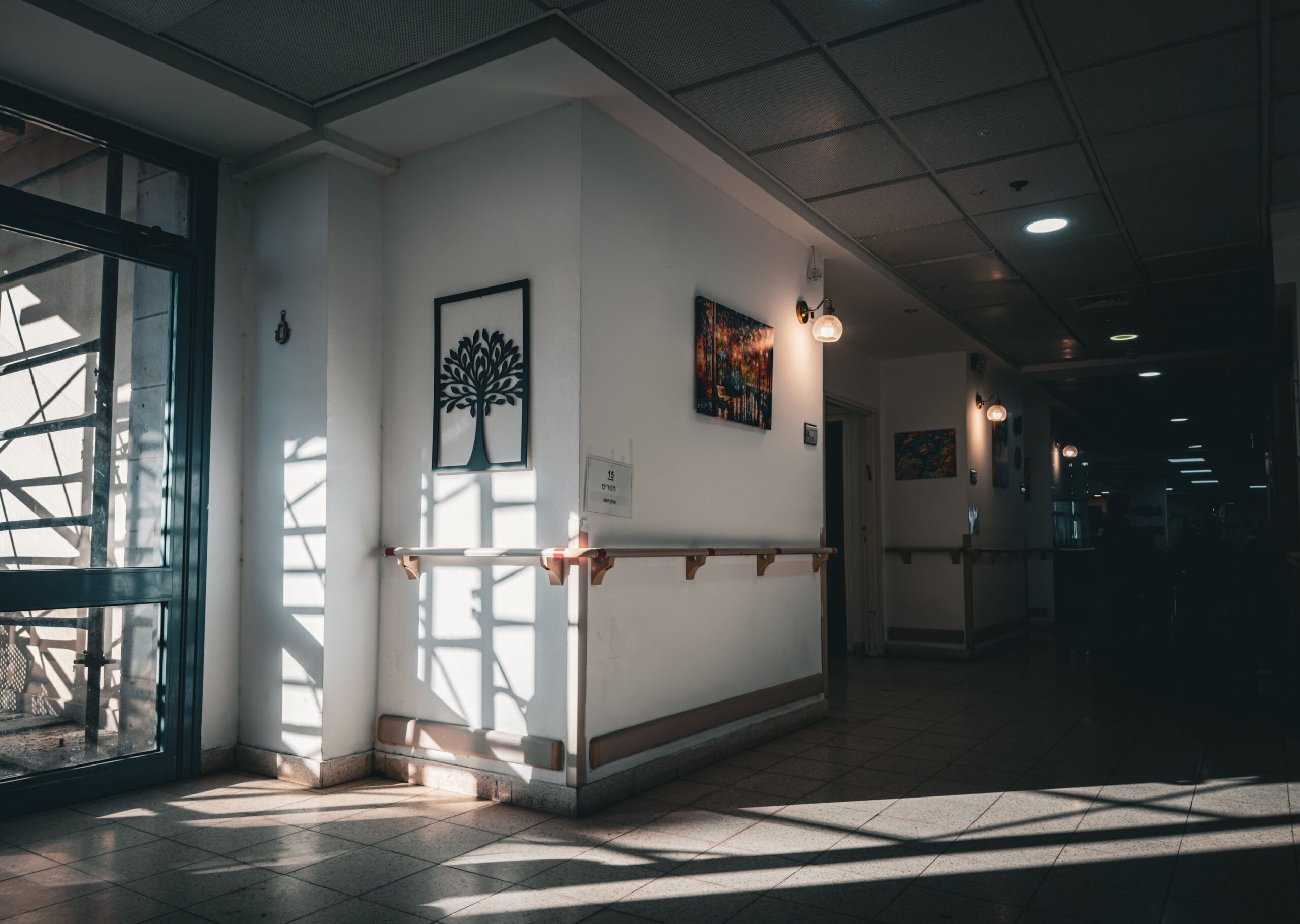 Bright care home corridor with durable flooring