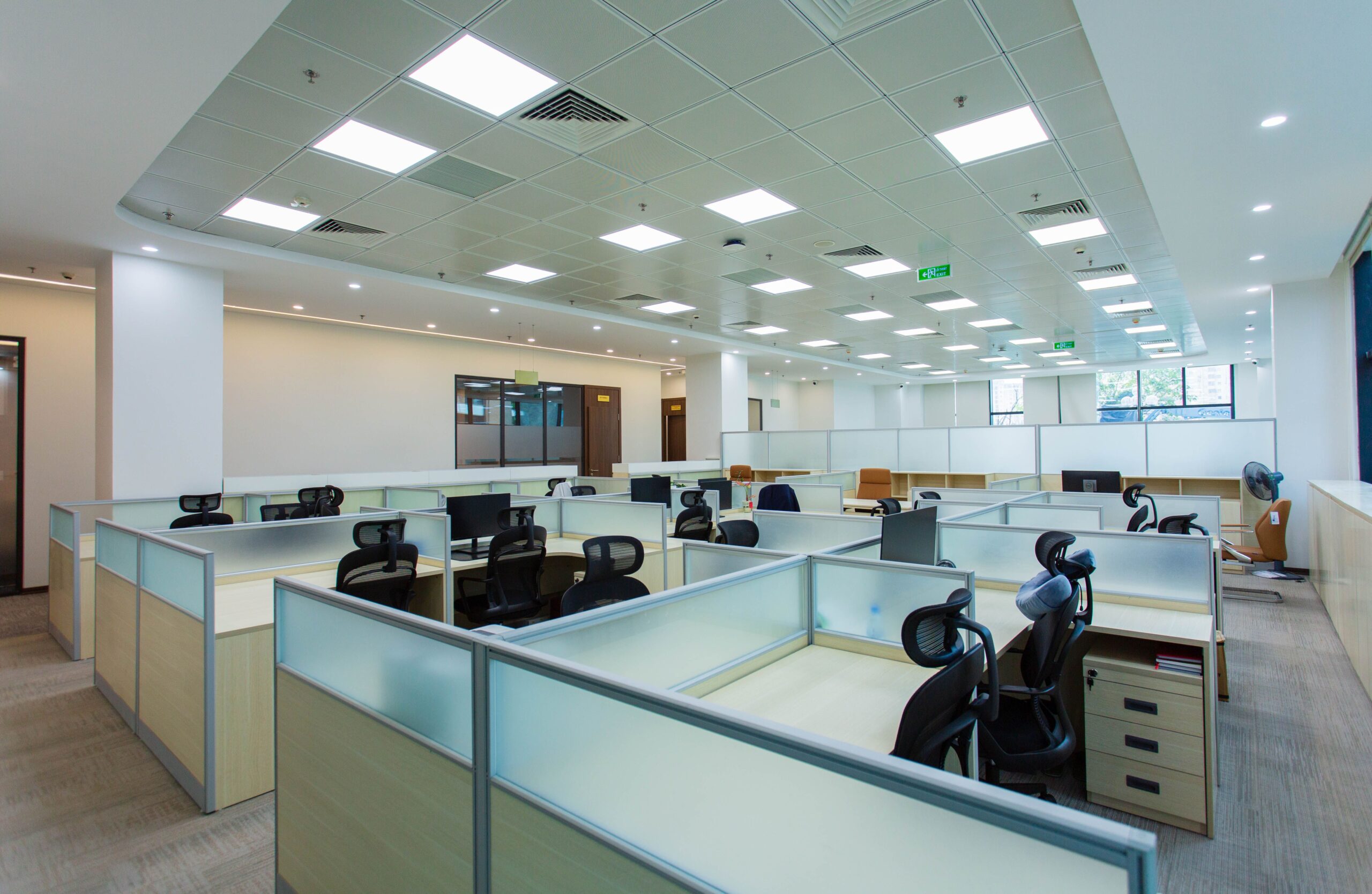 Open plan commercial office with carpet flooring
