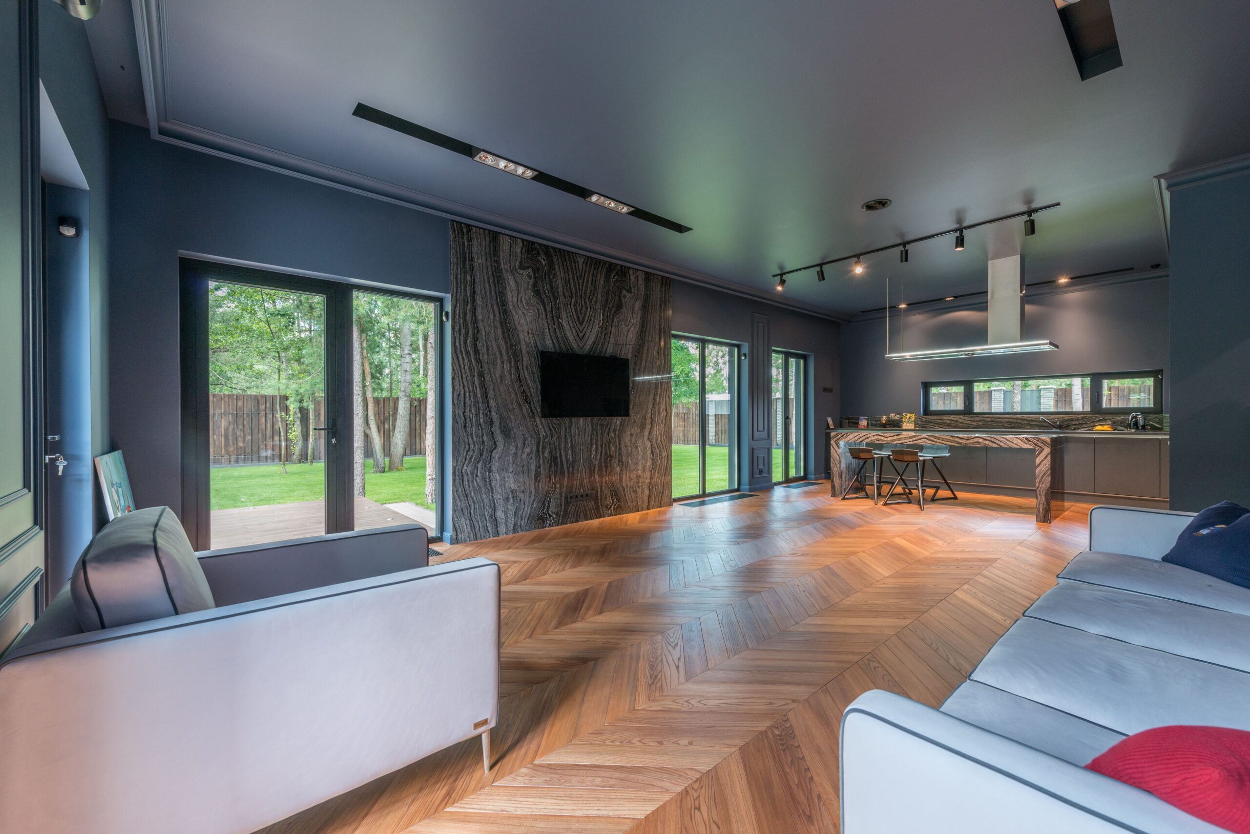 High-end residential living room with herringbone pattern flooring