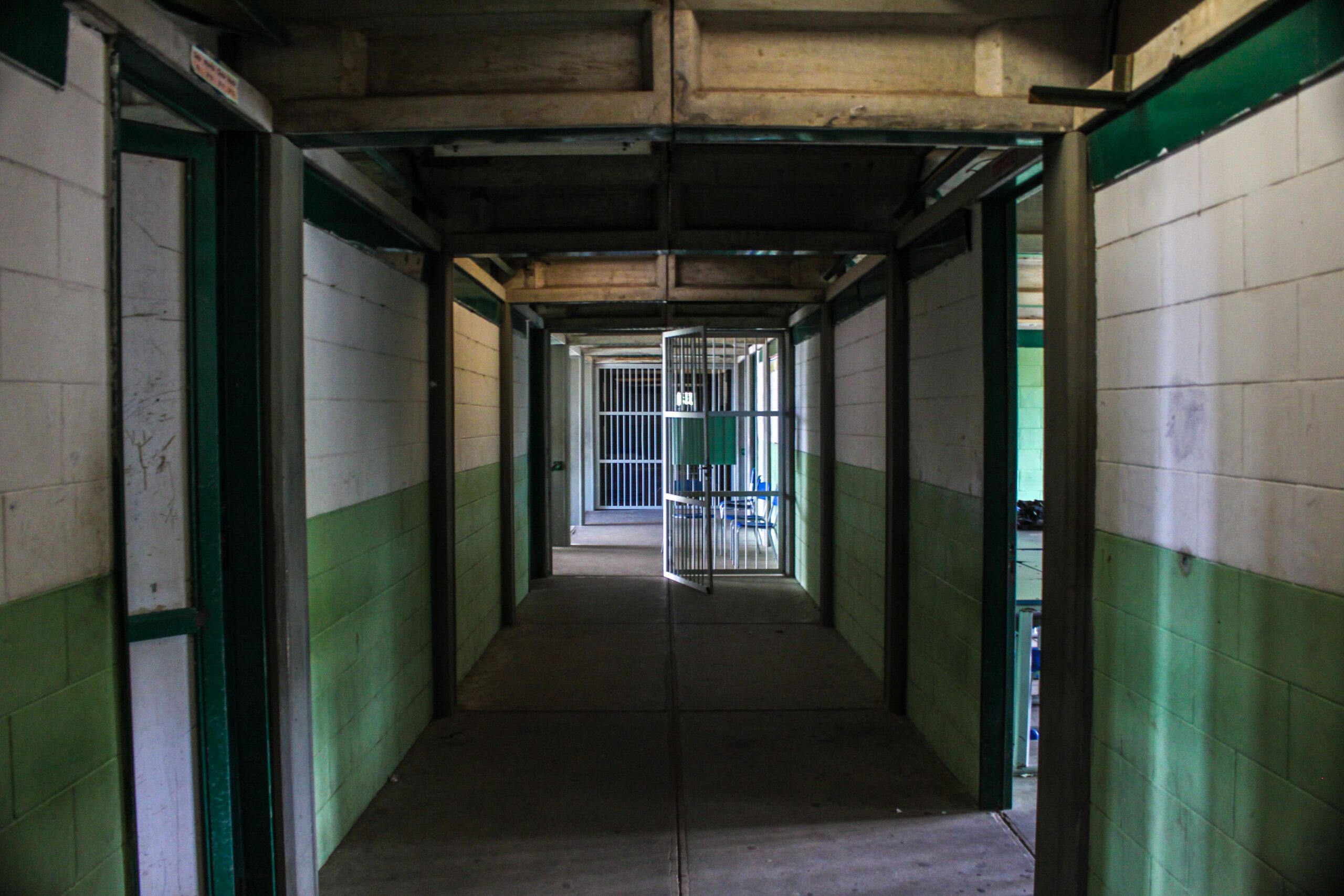 Secure prison corridor with cell doors